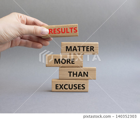 Results symbol. Wooden blocks with words Results Matter More Than Excuses. Businessman hand. Beautiful grey background. Business and Results concept. Copy space 140352303