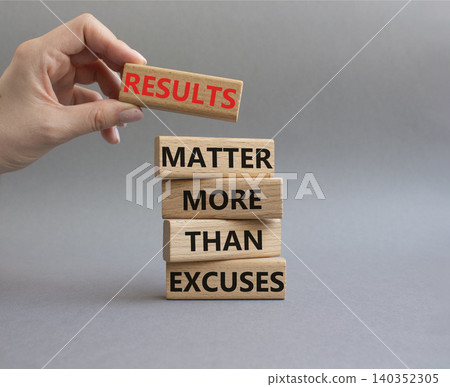Results symbol. Wooden blocks with words Results Matter More Than Excuses. Businessman hand. Beautiful grey background. Business and Results concept. Copy space 140352305