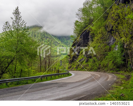 Winding mountain path, the Trans-Hajar highway in Georgia 140353021