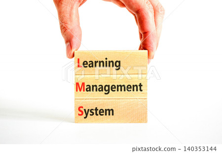 LMS learning management system symbol. Concept words LMS learning management system on beautiful wooden blocks. Beautiful white background. Business LMS learning management system concept. Copy space LMS learning management system symbol. Concept words LMS learning management system on beautiful wooden blocks. Beautiful white background. Business LMS learning management system concept. Copy space 140353144