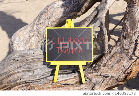 Childhood trauma words symbol. Concept words Childhood trauma on beautiful black blackboard. Beautiful old tree background. Psychological childhood trauma support concept. Copy space. Childhood trauma words symbol. Concept words Childhood trauma on beautiful black blackboard. Beautiful old tree background. Psychological childhood trauma support concept. Copy space. 140353178