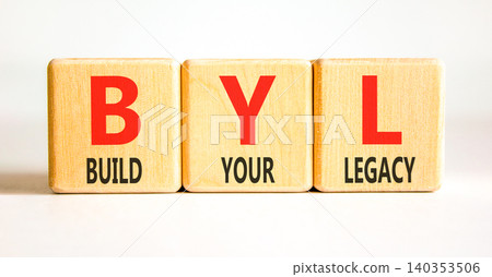 BYL build your legacy symbol. Concept words BYL build your legacy on beautiful wooden blocks. Beautiful white background. Business BYL build your legacy concept. Copy space BYL build your legacy symbol. Concept words BYL build your legacy on beautiful wooden blocks. Beautiful white background. Business BYL build your legacy concept. Copy space 140353506