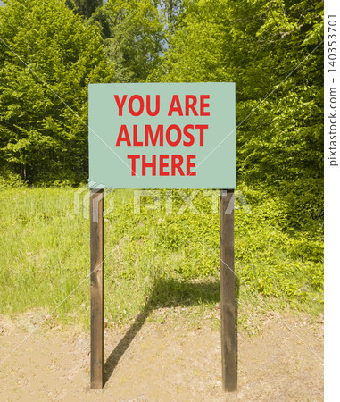 You are almost there words symbol. Concept words You are almost there on beautiful green road sign. Beautiful forest background. Business You are almost there motivational support concept. Copy space You are almost there words symbol. Concept words You are almost there on beautiful green road sign. Beautiful forest background. Business You are almost there motivational support concept. Copy space 140353701