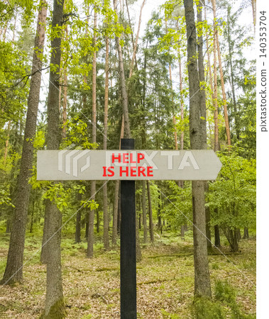 Help is here and support words symbol. Concept words Help is here on beautiful grey road sign. Beautiful green forest background. Business help is here and support concept. Copy space. Help is here and support words symbol. Concept words Help is here on beautiful grey road sign. Beautiful green forest background. Business help is here and support concept. Copy space. 140353704