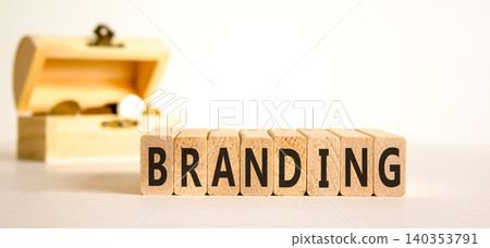 Branding brand word symbol. Concept word Branding on beautiful wooden blocks. Beautiful white background. Beautiful chest with coins. Business support help branding brand word concept. Copy space. Branding brand word symbol. Concept word Branding on beautiful wooden blocks. Beautiful white background. Beautiful chest with coins. Business support help branding brand word concept. Copy space. 140353791