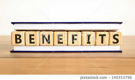 Benefits word symbol. Concept word Benefits on beautiful wooden blocks in beautiful book. Beautiful wooden table white background. Business support help benefits word concept. Copy space. Benefits word symbol. Concept word Benefits on beautiful wooden blocks in beautiful book. Beautiful wooden table white background. Business support help benefits word concept. Copy space. 140353796