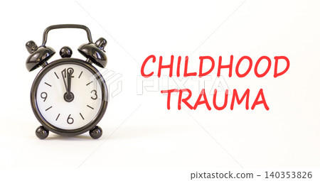 Childhood trauma words symbol. Concept words Childhood trauma on beautiful white paper. Beautiful white background. Black alarm clock. Psychological childhood trauma support concept. Copy space. Childhood trauma words symbol. Concept words Childhood trauma on beautiful white paper. Beautiful white background. Black alarm clock. Psychological childhood trauma support concept. Copy space. 140353826