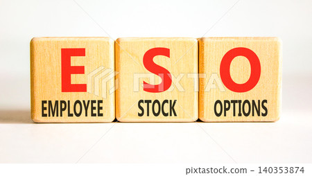 ESO employee stock options symbol. Concept words ESO employee stock options on beautiful wooden blocks. Beautiful white background. Business ESO employee stock options concept. Copy space. 140353874