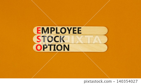 ESO employee stock option symbol. Concept words ESO employee stock option on beautiful wooden sticks. Beautiful orange background. Business ESO employee stock option concept. Copy space. ESO employee stock option symbol. Concept words ESO employee stock option on beautiful wooden sticks. Beautiful orange background. Business ESO employee stock option concept. Copy space. 140354027