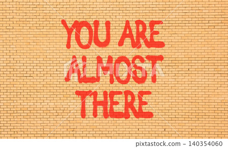 You are almost there words symbol. Concept words You are almost there on beautiful brick wall. Beautiful brick wall background. Business You are almost there motivational support concept. Copy space. 140354060