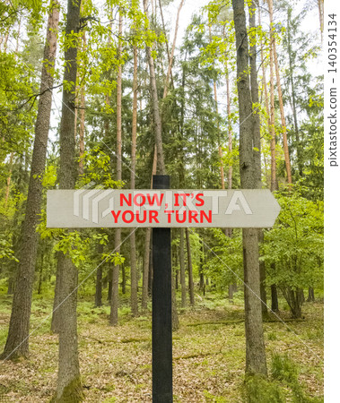 Now it's your turn words symbol. Concept words Now it's your turn on beautiful grey road sign. Beautiful green forest background. Business Now it's your turn motivational support concept Copy space Now it's your turn words symbol. Concept words Now it's your turn on beautiful grey road sign. Beautiful green forest background. Business Now it's your turn motivational support concept Copy space 140354134