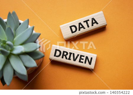 STRONG IMPACT symbol. Concept word STRONG IMPACT on wooden blocks. Beautiful orange background with succulent plant. Business and STRONG IMPACT concept. Copy space STRONG IMPACT symbol. Concept word STRONG IMPACT on wooden blocks. Beautiful orange background with succulent plant. Business and STRONG IMPACT concept. Copy space 140354222