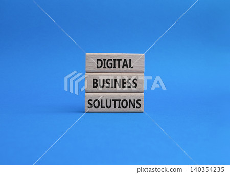 Digital Business Solutions symbol. Concept word Digital Business Solutions on wooden blocks. Beautiful blue background. Business and Digital Business Solutions. Copy space Digital Business Solutions symbol. Concept word Digital Business Solutions on wooden blocks. Beautiful blue background. Business and Digital Business Solutions. Copy space 140354235