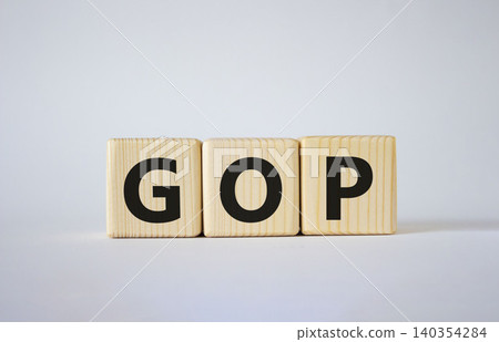 GOP - Gross Operating Profit symbol. Concept word GOP on wooden cubes. Beautiful white background. Business and GOP concept. Copy space. GOP - Gross Operating Profit symbol. Concept word GOP on wooden cubes. Beautiful white background. Business and GOP concept. Copy space. 140354284