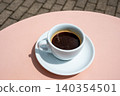 Cup of coffee on pink table Cup of coffee on pink table 140354501