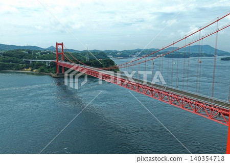 An aerial photograph showing the Hirado Bridge in Nagasaki Prefecture from a diagonal angle. An aerial photograph showing the Hirado Bridge in Nagasaki Prefecture from a diagonal angle. 140354718