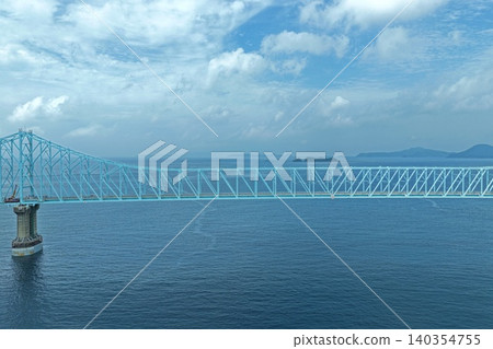 Aerial photograph of the Ikitsuki Bridge in Hirado City, Nagasaki Prefecture, taken from the sea. Aerial photograph of the Ikitsuki Bridge in Hirado City, Nagasaki Prefecture, taken from the sea. 140354755