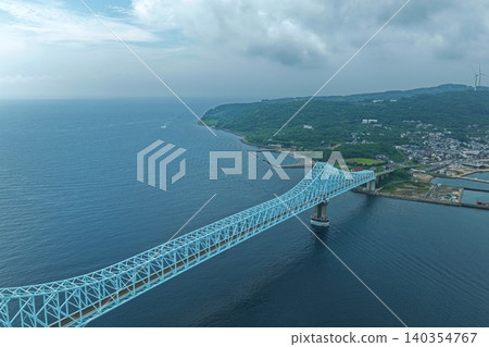 An aerial photograph overlooking the Ikitsuki Bridge and the strait in Hirado City, Nagasaki Prefecture. An aerial photograph overlooking the Ikitsuki Bridge and the strait in Hirado City, Nagasaki Prefecture. 140354767