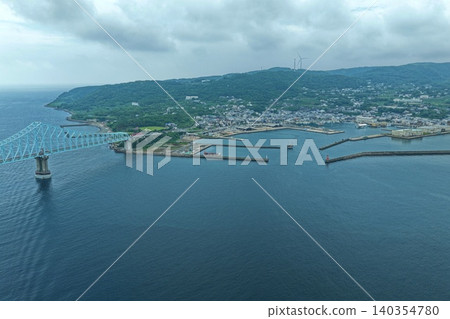 Aerial photograph of Ikitsuki Bridge and Tateura Fishing Port in Hirado City, Nagasaki Prefecture. Aerial photograph of Ikitsuki Bridge and Tateura Fishing Port in Hirado City, Nagasaki Prefecture. 140354780