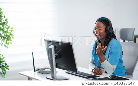 Nurse in headset providing telehealth medical advice online Nurse in headset providing telehealth medical advice online 140355147