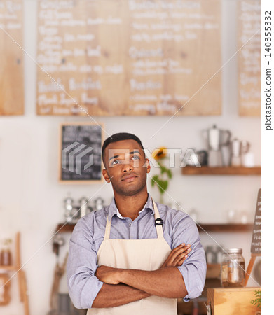 Cafe shop, black person and entrepreneur thinking of small business as barista, professional and owner. Man, standing and thoughtful of idea for startup of store in food industry of Cape Town Cafe shop, black person and entrepreneur thinking of small business as barista, professional and owner. Man, standing and thoughtful of idea for startup of store in food industry of Cape Town 140355332
