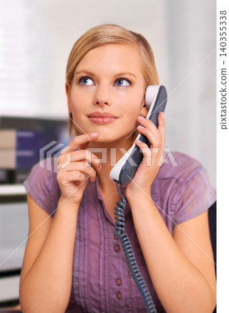 Secretary, woman and landline telephone in office to listen, deal or contact with thinking for question. Receptionist, person and employee with smile for phone call with news, network or chat at job Secretary, woman and landline telephone in office to listen, deal or contact with thinking for question. Receptionist, person and employee with smile for phone call with news, network or chat at job 140355338