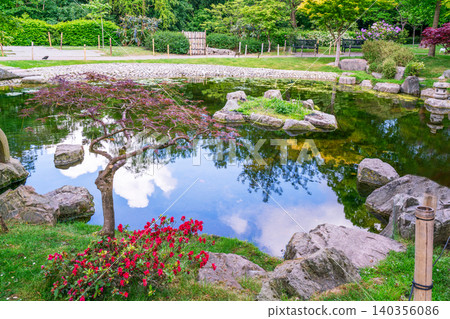 Scenic landscape view of Kyoto Garden in Holland Park, West London, during a sunny spring day. 140356086