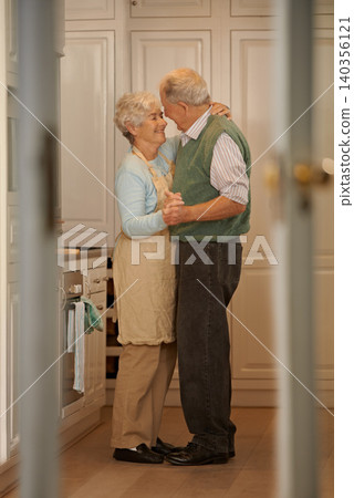 Elderly, couple and happy with dancing in kitchen for bonding, support and holding hands with romance. Senior, man and woman with hug, embrace and smile for relationship, dancer and love in home Elderly, couple and happy with dancing in kitchen for bonding, support and holding hands with romance. Senior, man and woman with hug, embrace and smile for relationship, dancer and love in home 140356121