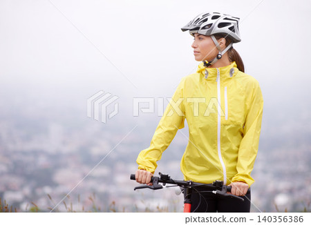 Bicycle, thinking and woman outdoor for exercise, workout or cycling for body health with mockup space on fog in winter. Fitness, mountain bike and serious person travel on transportation with mist Bicycle, thinking and woman outdoor for exercise, workout or cycling for body health with mockup space on fog in winter. Fitness, mountain bike and serious person travel on transportation with mist 140356386