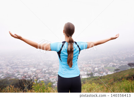 Fitness, freedom and sports with runner woman outdoor in mountains for cardio training or workout. Exercise, nature and view with athlete running in foggy morning for health or wellness from back Fitness, freedom and sports with runner woman outdoor in mountains for cardio training or workout. Exercise, nature and view with athlete running in foggy morning for health or wellness from back 140356413