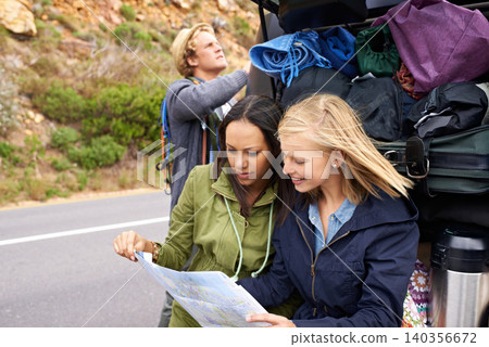 Happy woman, friends and map with car for navigation, destination or road trip in travel together. Female person or young group preparing vehicle with luggage or document for location or direction Happy woman, friends and map with car for navigation, destination or road trip in travel together. Female person or young group preparing vehicle with luggage or document for location or direction 140356672