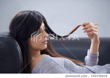 Hair, woman relax on sofa and beauty in studio, cosmetology and makeup isolated on white background. Check haircare, wellness and cosmetic care, salon or keratin treatment for growth and shine Hair, woman relax on sofa and beauty in studio, cosmetology and makeup isolated on white background. Check haircare, wellness and cosmetic care, salon or keratin treatment for growth and shine 140356834