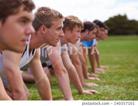Group, men and field for push up with fitness, training and health with friends for sport, challenge or wellness. People, athlete and teamwork with exercise, workout and together on field for muscle Group, men and field for push up with fitness, training and health with friends for sport, challenge or wellness. People, athlete and teamwork with exercise, workout and together on field for muscle 140357101