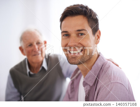 Father, adult son and portrait with love and bonding at home, respect and care with trust in healthy relationship. Happiness, support and men with time together for pride and loyalty with family Father, adult son and portrait with love and bonding at home, respect and care with trust in healthy relationship. Happiness, support and men with time together for pride and loyalty with family 140357108