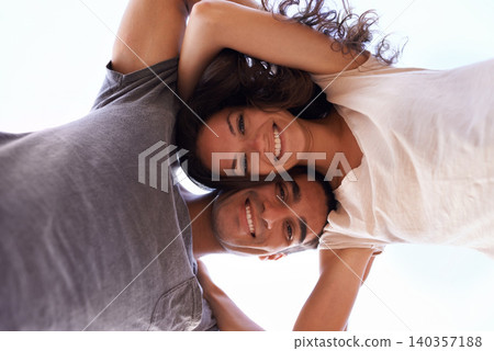 Portrait , love and couple with sky from below for outdoor travel adventure, summer holiday and embrace. Vacation, happy woman and man hug in nature on romantic date together with smile in Bali. Portrait , love and couple with sky from below for outdoor travel adventure, summer holiday and embrace. Vacation, happy woman and man hug in nature on romantic date together with smile in Bali. 140357188