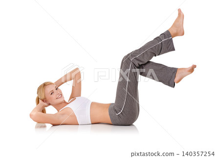 Woman, portrait or pilates and stretching in studio for exercise, healthy body or wellness with fitness or smile. Yoga, person and face or flexible in sportswear for core strength on white background Woman, portrait or pilates and stretching in studio for exercise, healthy body or wellness with fitness or smile. Yoga, person and face or flexible in sportswear for core strength on white background 140357254
