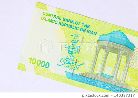 10000 Rial IRR cash banknote from Iran issued by Central Bank of Islamic Republic of Iran. 10000 Rial IRR cash banknote from Iran issued by Central Bank of Islamic Republic of Iran. 140357317