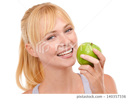 Smile, studio and portrait of woman with apple for vegan, diet and nutrition benefits for wellness. Food, face and happy person with fruit for vitamin c, detox and gut health on white background Smile, studio and portrait of woman with apple for vegan, diet and nutrition benefits for wellness. Food, face and happy person with fruit for vitamin c, detox and gut health on white background 140357336