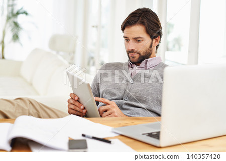 Journalist, man and home with laptop on tablet for research, online and information for newspaper article. Freelancer, remote work and living room to write for publication with news and report Journalist, man and home with laptop on tablet for research, online and information for newspaper article. Freelancer, remote work and living room to write for publication with news and report 140357420