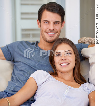 Happy, sofa and portrait of couple in home for bonding, relationship and relax together. Love, dating and man and woman embrace, hug and smile on couch for support, care and commitment in living room Happy, sofa and portrait of couple in home for bonding, relationship and relax together. Love, dating and man and woman embrace, hug and smile on couch for support, care and commitment in living room 140357530