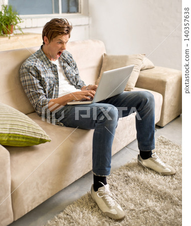 Remote work, stress and man screaming at laptop on sofa with glitch, mistake or 404 at home. Freelance, anger or male telework consultant frustrated by connection, fail or deadline disaster in house Remote work, stress and man screaming at laptop on sofa with glitch, mistake or 404 at home. Freelance, anger or male telework consultant frustrated by connection, fail or deadline disaster in house 140357638
