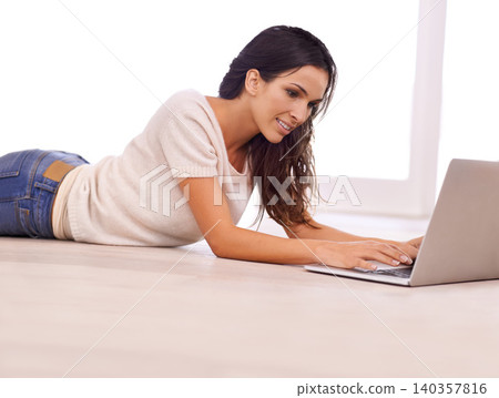Relax, smile and laptop with woman on floor of living room in home for email, internet or research. Computer, social media and typing with happy young person in apartment for website browsing Relax, smile and laptop with woman on floor of living room in home for email, internet or research. Computer, social media and typing with happy young person in apartment for website browsing 140357816