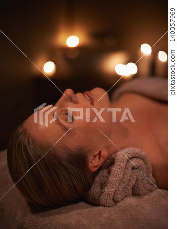 Face massage, spa and wellness with woman, luxury and candle with hospitality and peace. Person, facial and girl with stress relief or healthy with vacation or beauty with holiday, detox or self care Face massage, spa and wellness with woman, luxury and candle with hospitality and peace. Person, facial and girl with stress relief or healthy with vacation or beauty with holiday, detox or self care 140357969