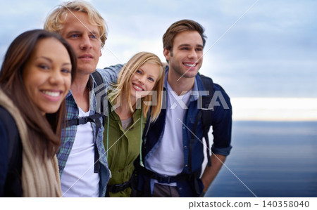 Friends, people in selfie and travel with ocean, hiking and trekking outdoor with memory for social media. Happy together in nature, smile in picture for post and adventure the coast of Ireland Friends, people in selfie and travel with ocean, hiking and trekking outdoor with memory for social media. Happy together in nature, smile in picture for post and adventure the coast of Ireland 140358040