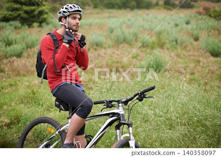 Fitness, bike and man cycling with helmet for adventure, discovery or off road sports hobby. Exercise, health and safety with young cyclist on bicycle in countryside for cardio training or workout Fitness, bike and man cycling with helmet for adventure, discovery or off road sports hobby. Exercise, health and safety with young cyclist on bicycle in countryside for cardio training or workout 140358097