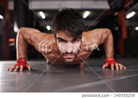 Man, portrait and push up or fitness in gym, athlete and topless for exercise and workout. Male person, body builder and performance for challenge or practice, training and serious for competition Man, portrait and push up or fitness in gym, athlete and topless for exercise and workout. Male person, body builder and performance for challenge or practice, training and serious for competition 140358259