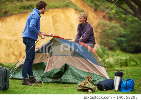 Camping, men and happy with tent for assemble on grass in nature with equipment for holiday, relax and vacation. People, getting ready and campsite in woods for adventure, travel or bonding in forest 140358295