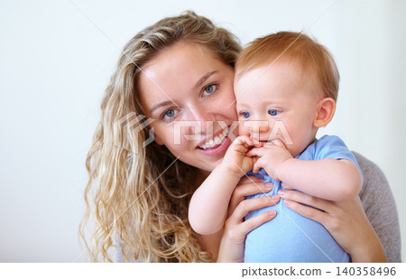 Happy mother, portrait and hug with baby for love, embrace or care in trust or bonding together at home. Face of mom or little toddler with smile for family, childhood or motherhood in relax at house Happy mother, portrait and hug with baby for love, embrace or care in trust or bonding together at home. Face of mom or little toddler with smile for family, childhood or motherhood in relax at house 140358496