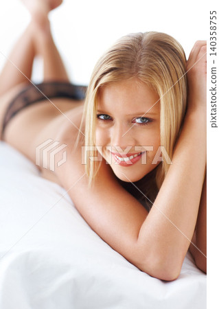 Woman, bed and topless or lingerie with smile in bedroom at home, confidence and satisfied with body. Fashion, female person and house with lace underwear or happiness for comfort and valentines day. Woman, bed and topless or lingerie with smile in bedroom at home, confidence and satisfied with body. Fashion, female person and house with lace underwear or happiness for comfort and valentines day. 140358755