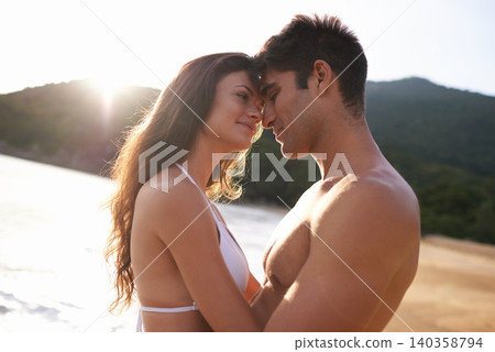 Beach, date and couple with love at on holiday or travel to Bali on vacation in summer. Tropical, island and man with gratitude for happy woman and smile with kindness, care and support together Beach, date and couple with love at on holiday or travel to Bali on vacation in summer. Tropical, island and man with gratitude for happy woman and smile with kindness, care and support together 140358794